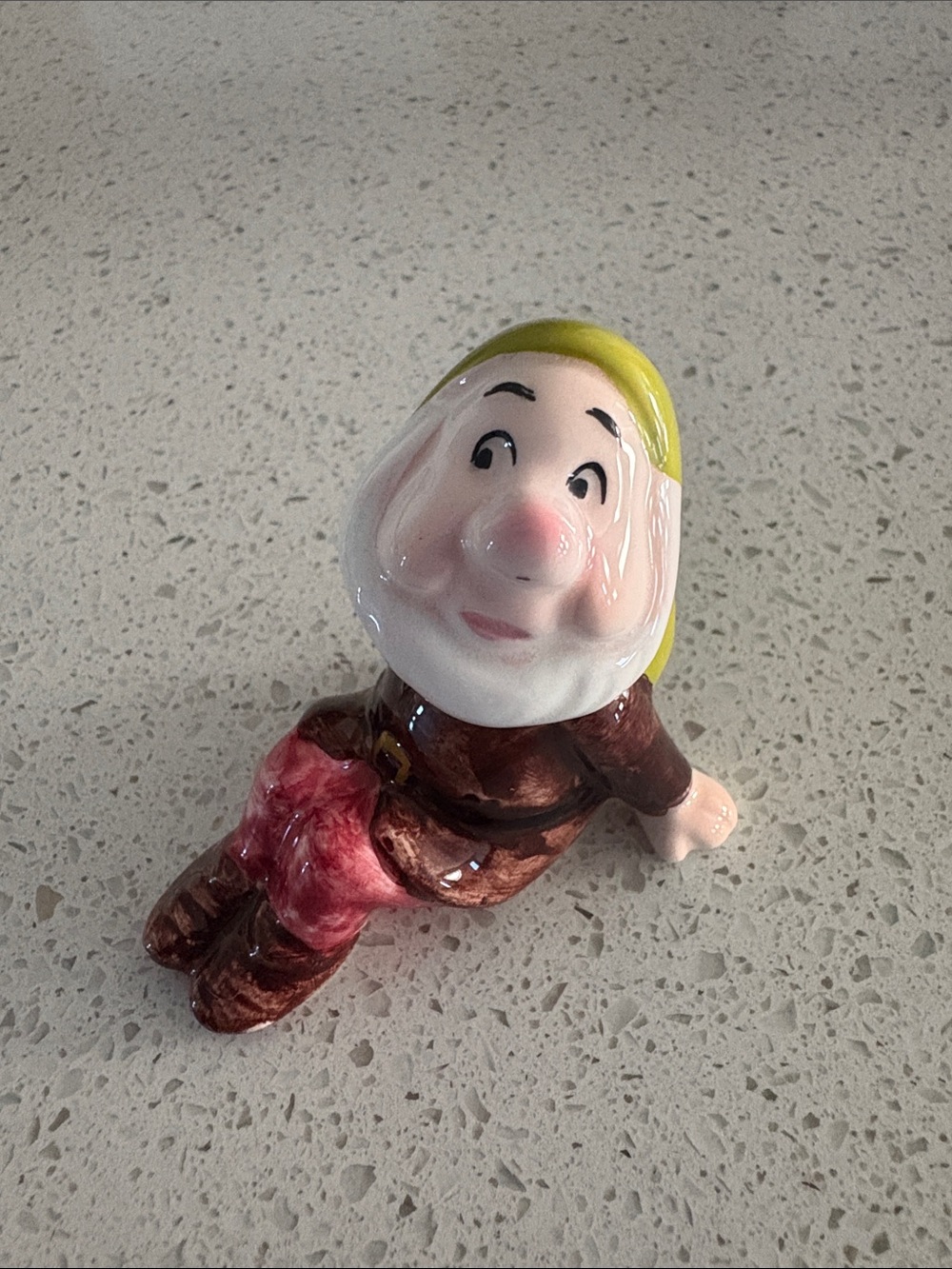 Disney Vintage Ceramic Sneezy Figurine in Yellow, Brown and Pink